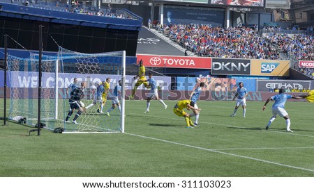 New York, NY - August 29, 2015: NYC FC team defends against Columbus Crew during game between New York City FC and Columbus Crew SC at Yankee Stadium