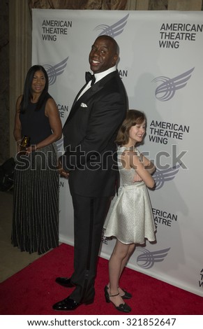New York, NY - September 28, 2015: Magic Johnson, Sydney Lucas, Cookie Johnson attend American Theatre Wing 2015 gala at Plaza Hotel
