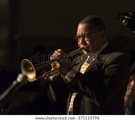 New York, NY - January 14, 2016: Wynton Marsalis plays trumpet at charity concert Jazz Legends for Disability Pride during Winter Jazz festival at Quaker Friends Meeting Hall
