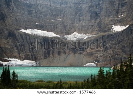 View of the Iceberg Lake in the National Glacier Park, Montana USA under the sunshine