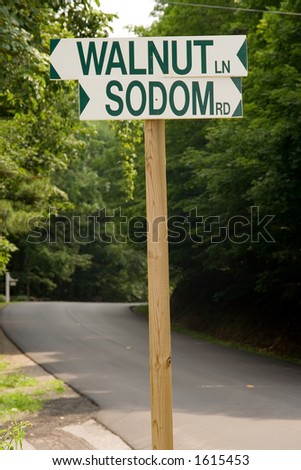 Road signs to Sodom road and Walnut lane