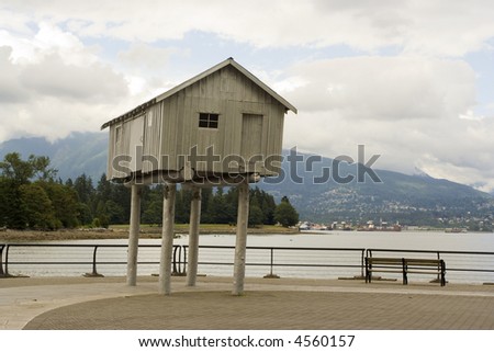 light shed in Vancouver harbor recalls Russian fairy tale hut on chicken legs