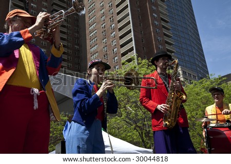 NEW YORK - MAY 2: Street musicians perform at Tribeca film festival family fair on May 2, 2009 in New York City.