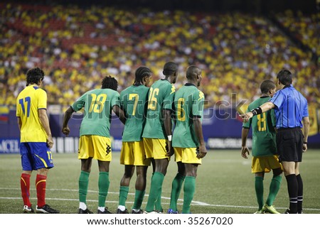 EAST RUTHERFORD NJ - AUGUST 12: Team Jamaica defends during the International Friendly match against Ecuador at Giants Stadium on August 12 2009 in East Rutherford NJ