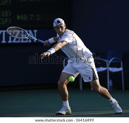 NEW YORK - SEPTEMBER 2: David Ferrer of Spain plays a shot during 1st round match against Alberto Martin of Spain at US Open on September 2, 2009 in New York.