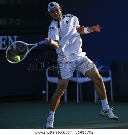 NEW YORK - SEPTEMBER 2: David Ferrer of Spain returns a shot during 1st round match against Alberto Martin of Spain at US Open on September 2, 2009 in New York.