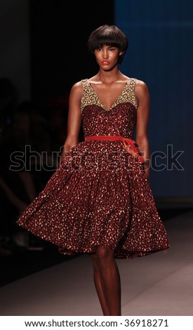 NEW YORK - SEPTEMBER 11: A model walks the runway at the Arise African Collective Jewel by Lisa Collection for Spring/Summer 2010 during Mercedes-Benz Fashion Week on September 11 2009 New York