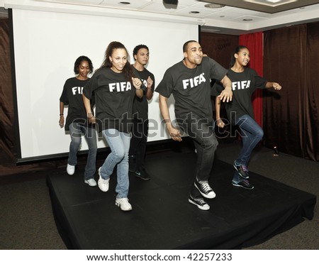 NEW YORK - DECEMBER 04: Dancers perform at the launch of the new FIFA collection and announcement of a draw of World Cup at South African Consulate on December 4, 2009 in NYC