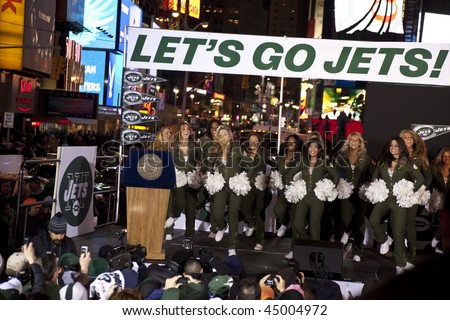 NEW YORK - JANUARY 21: Jets flight crew perform at the New York Jets AFC Championship game pep rally in Times Square on January 21, 2010 in New York City.