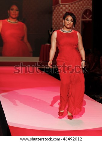 NEW YORK - FEBRUARY 11: Raven-Symone walks the runway [dress by Tadashi Shoji ] at the Heart Truth's Red Dress Collection for Fall 2010 during Mercedes-Benz Fashion Week on February 11, 2010 in New York
