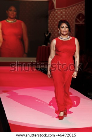 NEW YORK - FEBRUARY 11: Raven-Symone walks the runway [dress by Tadashi Shoji ] at the Heart Truth\'s Red Dress Collection for Fall 2010 during Mercedes-Benz Fashion Week on February 11, 2010 in New York