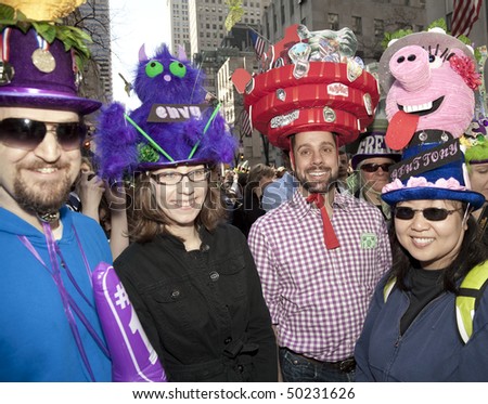 NEW YORK - APRIL 4: A group of people partakes and shows off hats in the Easter Bonnet Parade on 5th Avenue on April 4, 2010 in New York City.