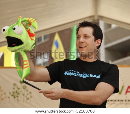 NEW YORK - MAY 01: Actor John Tartaglia from Imaging Ocean performs on stage at the Family Festival Street Fair during the 2010 Tribeca Film Festival on May 1, 2010 in New York City