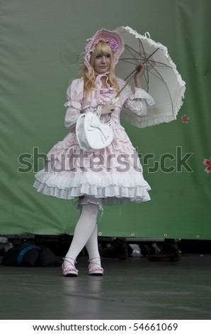 NEW YORK - JUNE 6: Model walks the stage to show Tokyo fashion Festa at Annual Japan Day in Central PArk on June 6, 2010 in New York City.