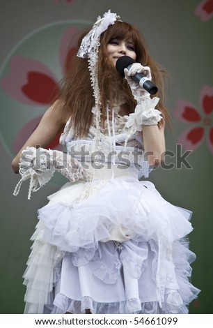 NEW YORK - JUNE 6: Model sings on stage to show Tokyo fashion Festa at Annual Japan Day in Central Park on June 6, 2010 in New York City.