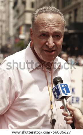 NEW YORK - JUNE 27: US Senator Charles Chuck Schumer gives interview at the 2010 New York City Gay Pride March on the streets of Manhattan on June 27, 2010 in New York City.