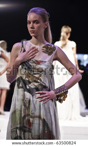 NEW YORK - SEPTEMBER 11: Model presents dress for new collection by Diego Binetti on Spring/Summer 2011 during Mercedes-Benz Fashion Week on September 11, 2010 in New York