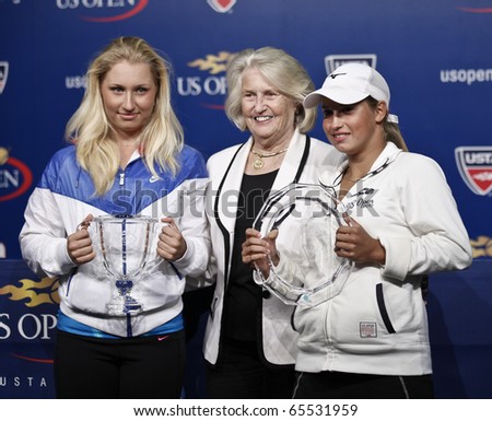 NEW YORK - SEPTEMBER 12: Trophy presentation for junior winner Daria Gavrilova of Russia and runner-up Yulia Putintseva of Russia with Lucy Garvin US Open Tennis Championship on Sep 12, 2010 in NYC