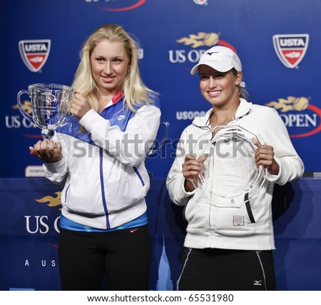 NEW YORK - SEPTEMBER 12: Trophy presentation for junior winner Daria Gavrilova of Russia and runner-up Yulia Putintseva of Russia US Open Tennis Championship on September 12, 2010 in New York, City.