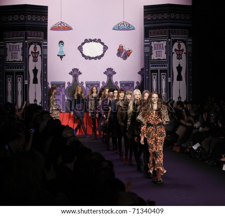 NEW YORK - FEBRUARY 16: Models walk runway for dress presentation by Anna Sui at Mercedes-Benz Fall/Winter 2011 Fashion Week on February 16, 2011 in New York City.