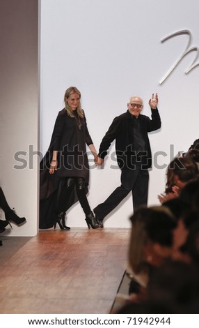 NEW YORK - FEBRUARY 13: Designer Max Azria and Lubov Azria walk the runway for Max Azria collection at Mercedes-Benz Fall/Winter 2011 Fashion Week on February 13, 2011 in New York City