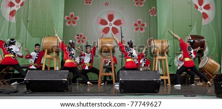 NEW YORK - MAY 22: Members of Japanese drum music group Soh Daiko perform as part of 5th annual Japan Day in Central Park on May 22, 2011 in New York City