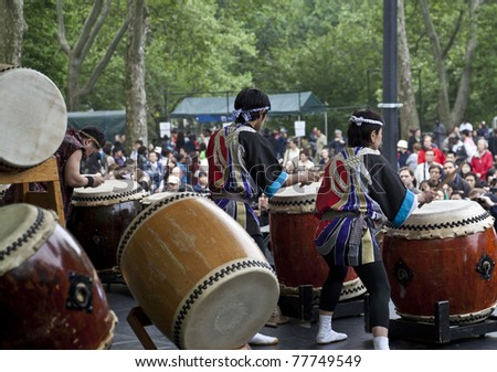 NEW YORK - MAY 22: Members of Japanese drum music group NY Suwa Taiko Association perform as part of 5th annual Japan Day in Central Park on May 22, 2011 in New York City