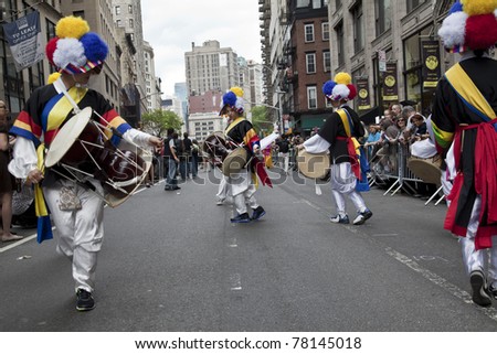 NEW YORK - MAY 21: Members of Korean Traditional Music and Dance institute dances on Broadway as part of New York Dance Parade on May 21, 2011 in New York City