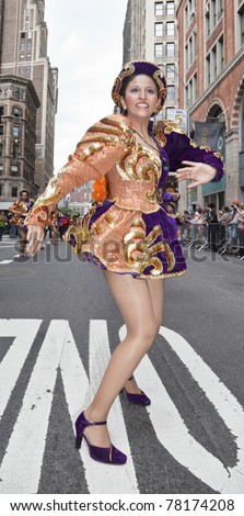 NEW YORK - MAY 21: Members of San Simon group dances on Broadway as part of New York Dance Parade on May 21, 2011 in New York City
