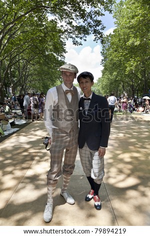 NEW YORK - JUNE 25: Unidentified men attend Michael Arenella and the Dreamland Orchestra the Jazz Age Dance Party on Governors Island on June 25, 2011 in New York City.