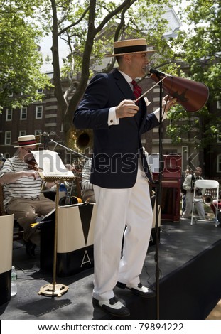 NEW YORK - JUNE 25: Michael Arenella sings at Michael Arenella and the Dreamland Orchestra the Jazz Age Dance Party on Governors Island on June 25, 2011 in New York City.