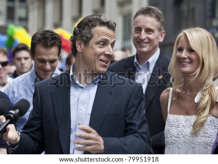 NEW YORK - JUNE 26: New York Governor Andrew Cuomo, Sandra Lee attend press conference at pride parade on June 26, 2011 in New York City, NY.