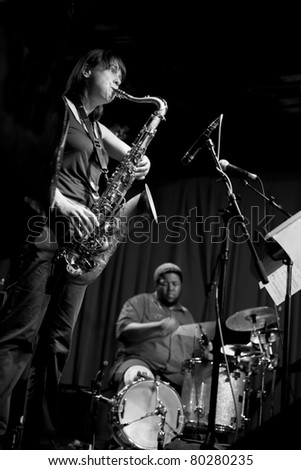 NEW YORK - JUNE 23: Ingrid Laubrock saxophone and Tyshawn Sorey drums of Paradoxical Frog perform at Sullivan Hall bar as part of annual Undead Jazz Festival on June 23, 2011 in New York City.