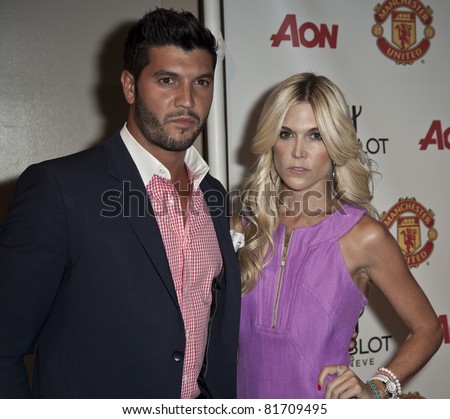 NEW YORK - JULY 25: Brian Mazza and Tinsley Mortimer attends Hublot 'Art of Fusion' fashion show with Sir Alex Ferguson & Manchester United at Cipriani, Wall Street on July 25, 2011 in New York City