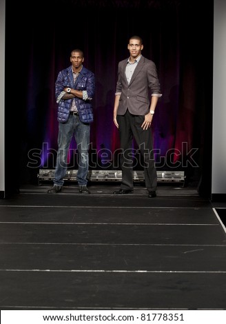 NEW YORK - JULY 25: Footballers Ashley Young & Chris Smalling walk runway at Hublot Art of Fusion fashion show with Sir Alex Ferguson & Manchester United at Cipriani, Wall Street on Jul 25 2011 in NYC