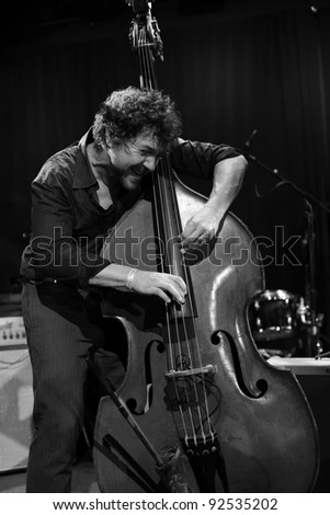 NEW YORK - JANUARY 07: Stephan Crump plays bass with Vijay Iyer trio as part of NYC Winter Jazz Festival at Le Poisson Rouge on January 07, 2012 in New York City