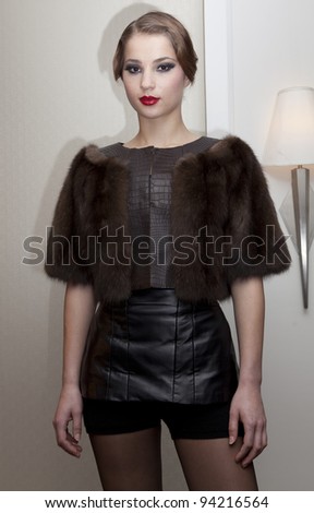 NEW YORK - FEBRUARY 02: A model shows evening wear for Marusya collection by Marina Ilchenko at Peninsula hotel in Manhattan on February 02, 2012 in New York.