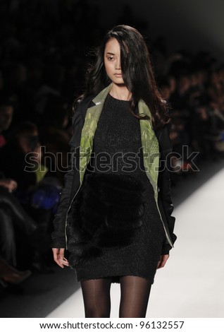 NEW YORK - FEBRUARY 11: Model walks runway for Vantan Tokyo collection by Cheryl Chee during Fashion week at Lincoln Center in Manhattan on February 11, 2012 in New York City