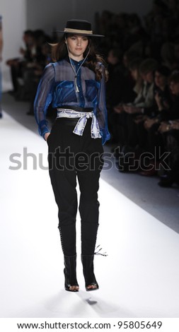 NEW YORK - FEBRUARY 13: Amanda ware walks runway for Carlos Miele collection during Fashion week at Lincoln Center in Manhattan on Feb 13, 2012 in New York City