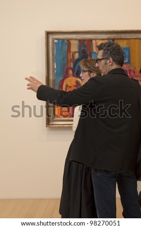NEW YORK - MARCH 22: Actor John Turturro and wife Katherine Borowitz attend opening of exhibition of paintings by Robert De Niro at DC Moore gallery in Manhattan on March 22, 2012 in New York City