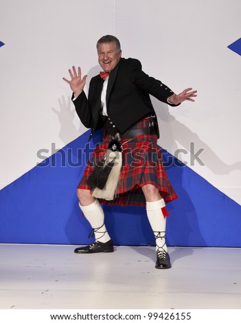 NEW YORK - APRIL 02: CEO of Pitcairn Investments Dirk Junge in kilt by Glenisla walks runway at fashion show From Scotland With Love at The Liberty Theatre on April 2, 2012 in New York City