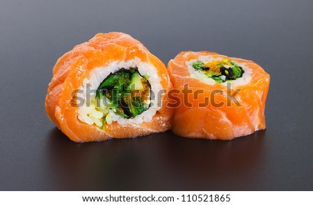 Sushi on a black matte background.