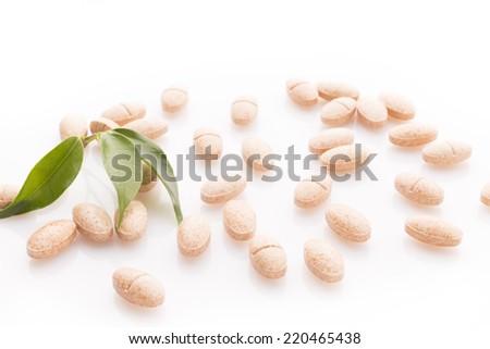 Natural vitamin supplements on the white  background.
