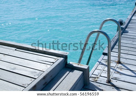 A ladder way into the open sea in maldives.