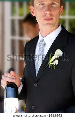 stock photo Male model wedding groom with wine