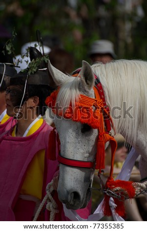 KYOTO - MAY 15: Walking horse on The Aoi Matsuri (Hollyhock Festival) held on May 15 2011 in Kyoto, Japan . It is one of Kyoto\'s renowned three great festivals