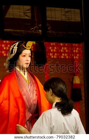 KYOTO, JAPAN- JUNE 11: An unidentified woman gets ready to participate in the annual \