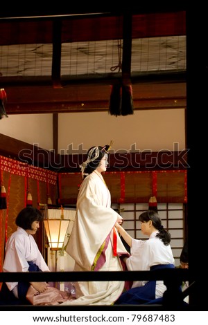 KYOTO, JAPAN- JUNE 11: An unidentified woman gets ready to participate in the annual 