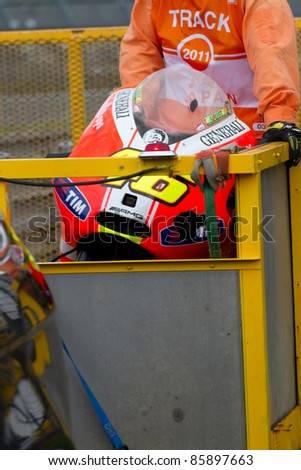 MOTEGI, JAPAN - OCTOBER 2:  The clashed motorcycle of Valentino Rossi on first lap at 2011 MotoGP of Japan on October 2, 2011 in Motegi, Japan.