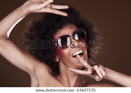 dancing girl with afro hair
